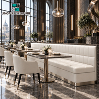 Ensemble de sièges de restaurant personnalisables en cuir blanc ivoire, tables à manger en marbre, chaises rembourrées, fabrication OEM ODM en Chine