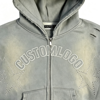 Ensemble survêtement homme oversize déchiré avec logo personnalisé : sweat à capuche zippé à écussons étoiles délavés et pantalon de jogging évasé à bords bruts – Vente en gros
