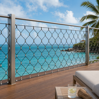 Filet de câbles tressés en acier inoxydable noir élégant et flexible pour terrasses de stations balnéaires et façades de luxe