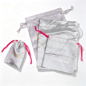 Sacs de rangement en satin personnalisables avec cordon de serrage pour cadeaux et accessoires, disponibles en différentes couleurs et tailles - Product Image 1