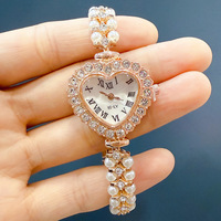 Montre à quartz en alliage pour femme, élégante et simple, ornée de diamants, avec bracelet en perles, forme cœur, ovale ou carrée, style luxe léger, à prix abordable
