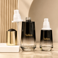 Ensemble de flacons et pots cosmétiques en verre noir dégradé de luxe avec bouchon doré brillant pour sérum et crème de soin