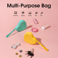 Pochette à rouge à lèvres mini cœur en silicone résistant à l'eau, sac cosmétique polyvalent, porte-clés et porte-monnaie, marque privée