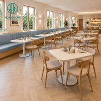 Banquette rembourrée en tissu Ron Group, table carrée en marbre, chaise en bois personnalisée, mobilier commercial pour restaurant