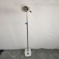 Lampe d'examen médical LED à 9 trous avec pédale de commande durable pour clinique, hôpital, chirurgie dentaire et gynécologie