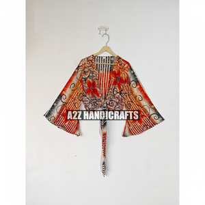 La mayoría de las tendencias Top corto de verano para mujer Manga acampanada Seda Wrap Tie Blusa Estampado floral Patrón de puntos Deep V Eco-Friendly Party Wear - Product Image 1