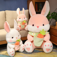 Vente en Gros Joli Lapin à Fourrure Tenant des Carottes Jouets en Peluche Lapin Jouets en Peluche Machine à Grosse Griffe
