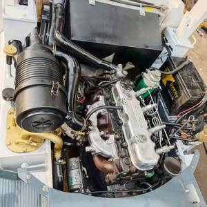 Used White TCM 2.5-Ton Diesel Forklift with Isuzu <b>Engine</b> Central Cylinder Design for Enhanced Maneuverability in Narrow Spaces - Product Image 6