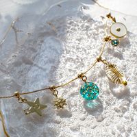 Vente en gros de bijoux pour femmes en cuivre plaqué or 18 carats pendentif en cuivre zircon étoile de soleil amour accessoires de bijoux à bricoler soi-même pour collier bracelet