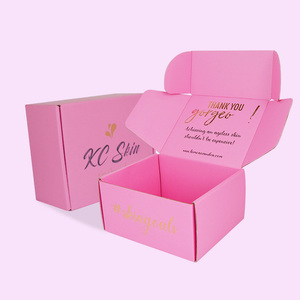 Scatole di imballaggio di spedizione rosa ondulate stampate con Logo personalizzato cosmetico per abbigliamento postale in carta di cartone colorato ecologico