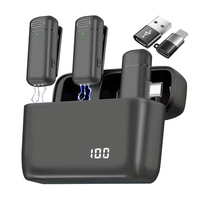 Microphone Lavalier Sans Fil 3-en-1 2.4G Anti-Bruit J13 pour iPhone iPad USB-C Android Ordinateur Portable avec Boîtier de Charge Clip Plug-and-Play