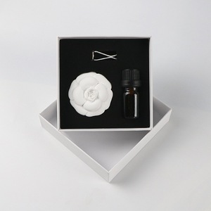 Difusor de ventilación sólido ecológico para mujer, ambientador de coche con forma de Camelia blanca con caja de regalo, pasta de incienso de piedra - Product Image 6