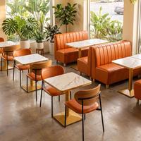 Ensemble de banquettes orange modernes pour restaurant, avec bancs rembourrés en PU, table en bois et chaises à structure métallique, pour projet de café