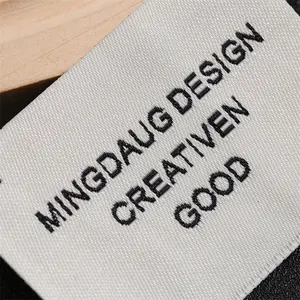 Custom progetta l'etichetta principale dell'indumento di dimensioni della moda per etichette tessute di abbigliamento personalizzato