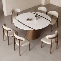 Table à manger moderne pliable et extensible en pierre frittée avec pieds en bois et 8 chaises pour usage domestique