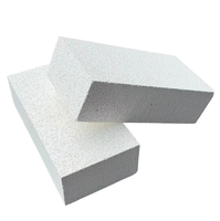 Brique réfractaire isolante légère en mullite frittée Tynason JM23/JM26/JM28/JM30 à faible conductivité thermique pour four à rouleaux, origine Henan