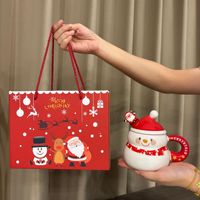 Vente en gros de tasses à café en céramique de Noël DingHui JF 400 ml avec motif de Père Noël, boîte cadeau avec couvercle, option de logo personnalisé, fabriqué en Chine