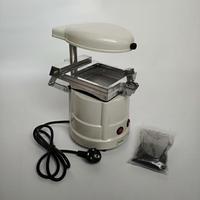 Machine de thermoformage sous vide dentaire pour la fabrication de gouttières orthodontiques