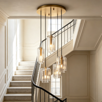 Lustre moderne à plusieurs niveaux en acier et verre, suspension multi-lumières en laiton et acier pour escalier, hall d'entrée, décoration de luxe pour maison française, villa