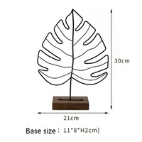 Maroquinerie en fil de fleurs en métal directement à l'usine, décoration artistique moderne, motif feuille montres, esthétique minimaliste avec support