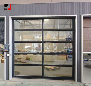 Elegante Puerta de Garaje Seccional Automática Residencial con Puerta de Entrada - Product Image 1