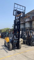 Chariot élévateur diesel d'occasion TCM 3 tonnes FD30 FD25 FD50 fabriqué au Japon avec mât hydraulique à trois étages en stock