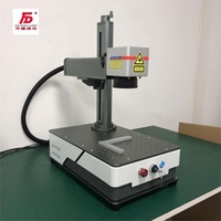 Máquina de Grabado Láser de Fibra de Alta Gama Haotian de 50W, Compatible con Formatos DXF, BMP, AI y DST para Marcado de Joyería Metálica