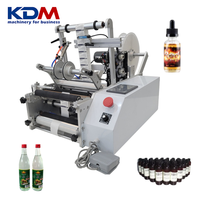 Machine d'étiquetage de bouteilles rondes compacte KDM-SL51 pour les bouteilles de boissons et de vin