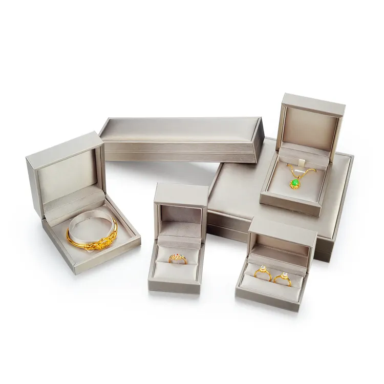 Çin tedarikçisi özel logo hediye paketleme toptan fiyat poliüretan deri mücevher kutuları