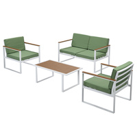 Chaise de jardin moderne en rotin vert avec coussin et pieds en métal blanc pour cour
