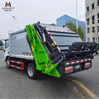 HEAVSTY Nouveau camion à ordures à compression zéro émission de 7 mètres cubes 145 KWH pour CLD5090ZYSBEV