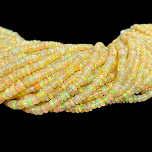 Perles Rondelles Lisses en Opale Éthiopienne AAA+ Jaune Feu 3-5mm, Fil de 16 Pouces, Opale Éthiopienne Welo - Product Image 1