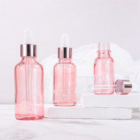 En stock flacon en verre de 5ml 10ml 15ml 20ml 30ml 50ml 100ml compte-gouttes en verre cosmétique rose avec bouchon en or