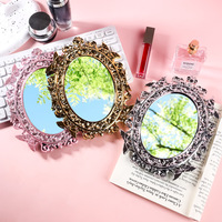 Miroir de maquillage rétro de style européen Internet Celebrity Galvanoplastie Desktop Miroir simple face Miroir de beauté de haute qualité