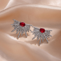 Boucles d'oreilles romantiques en gros Rolling Stone, nouveau modèle Ailes, entièrement serties de diamants, étoile scintillante, en alliage, matériau principal Guangdong Chine, unisexe