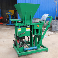 Machine à briques de terre populaire et économique pour l'Ouganda et le Cameroun, machine à briques de terre emboîtables
