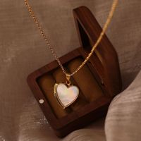 Collier pendentif médaillon commémoratif en forme de cœur en acier inoxydable et coquillage naturel, tendance - Pendentif à ouverture et fermeture