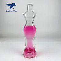 Bouteille en verre de boisson en forme de corps de femmes élégantes de la Californie de conception unique avec le couvercle en liège en bois pour la vodka whisky Gin vin spiritueux