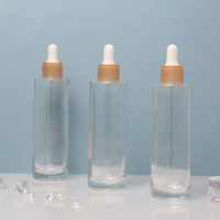 Flacon compte-gouttes de luxe 80 ml en verre transparent avec pompe pulvérisatrice, revêtement UV, pour sérum, essence, crème visage, gouttes pour les yeux