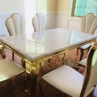 Ensemble de table à manger carrée minimaliste en marbre avec chaises à structure en acier inoxydable doré pour villa et mobilier de maison