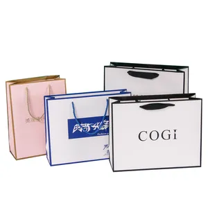 Support pour modèles d'emballage de logo personnalisé Impression de logo personnalisée Papier carton Emballage de shopping personnalisé Sac cadeau