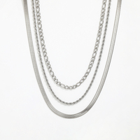 Collier triple couche en acier inoxydable plaqué or Joolim Jewelry : chaîne Figaro, chaîne corde, chaîne serpent - Vente en gros