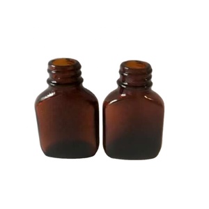 Botella de Vidrio Ámbar Plana de 10 ml con Serigrafía y Tapa con Pincel - Product Image 1