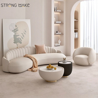 Canapé sectionnel incurvé blanc, style scandinave moderne et luxueux, idéal pour salon, hall d'hôtel ou petit appartement.