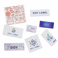 Étiquettes de sublimation de teinture pour vêtements Prix d'usine Logo de marque personnalisé Étiquettes tissées pour vêtements