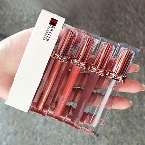 Nuevo tubo de brillo de labios de lujo cuadrado transparente personalizado con varita con lazos de oro rosa en <span class=keywords><strong>la</strong></span> tapa Esmalte de labios Tubo vacío Base de brillo de labios - Product Image 1