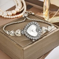 Montre-bracelet pour femme en alliage de quartz, exquise et mignonne, en forme de cœur, écologique, tendance, décontractée, luxueuse, avec aiguilles incrustées de diamants
