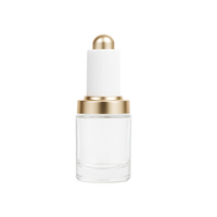 Flacon compte-gouttes en verre transparent de 30ml pour le visage et le corps avec couvercle en or blanc de luxe personnalisé pour cosmétiques