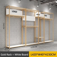 Porte-vêtements mural modulaire en métal noir et or de luxe pour boutique de robes de mariée et magasin de détail