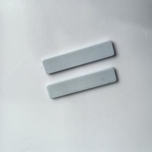 GSC 860-960Mhz Passive UHF RFID Silicone Laundry Tag 55*12*2.4mm for Apparel Hotel Washing Management <b>Access</b> <b>Control</b> <b>Cards</b> - Product Image 3